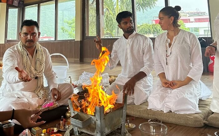 Person meditating at a spiritual retreat in the Himalayas